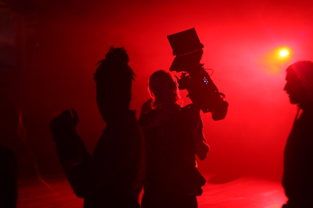Commercial video production on a professional set with product and lighting